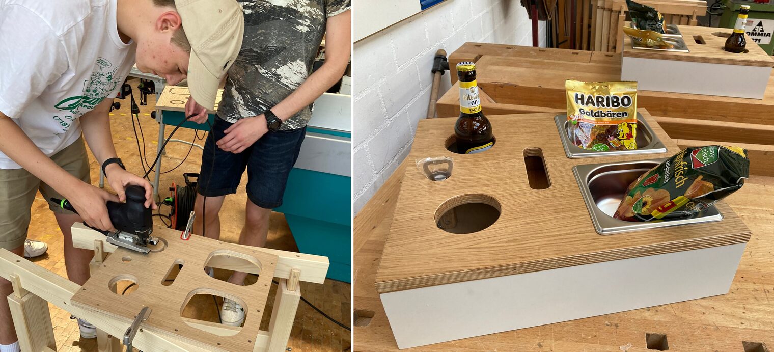 Projekttage Schreiner-Workshop, Zwei Männer bauen eine Snackbox, rechts die fertige Snackbox